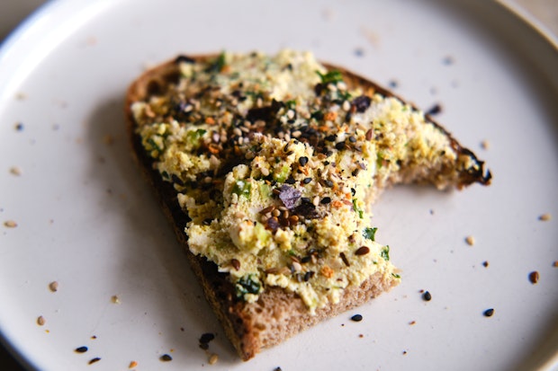 furikake sprinkle across the top of an open-faced sandwich