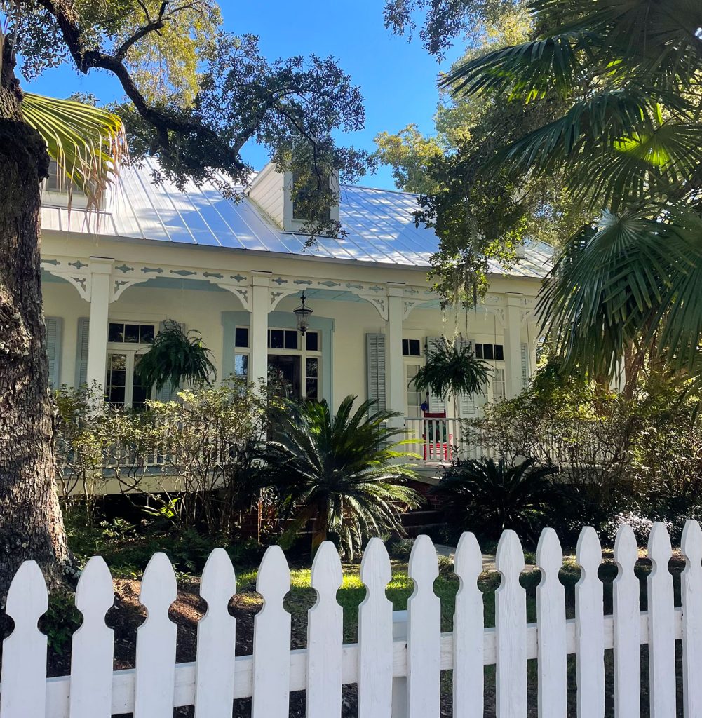 Exterior of Southern Style Home In In Ocean Springs Mississippi With Picket Fence